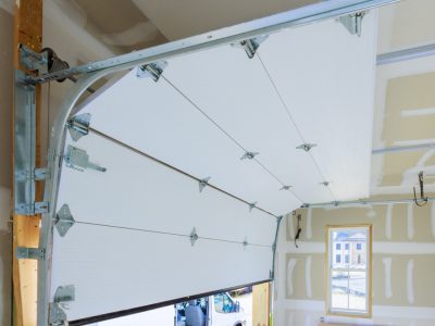 Installation of rolling shutters plastic garage doors in new house